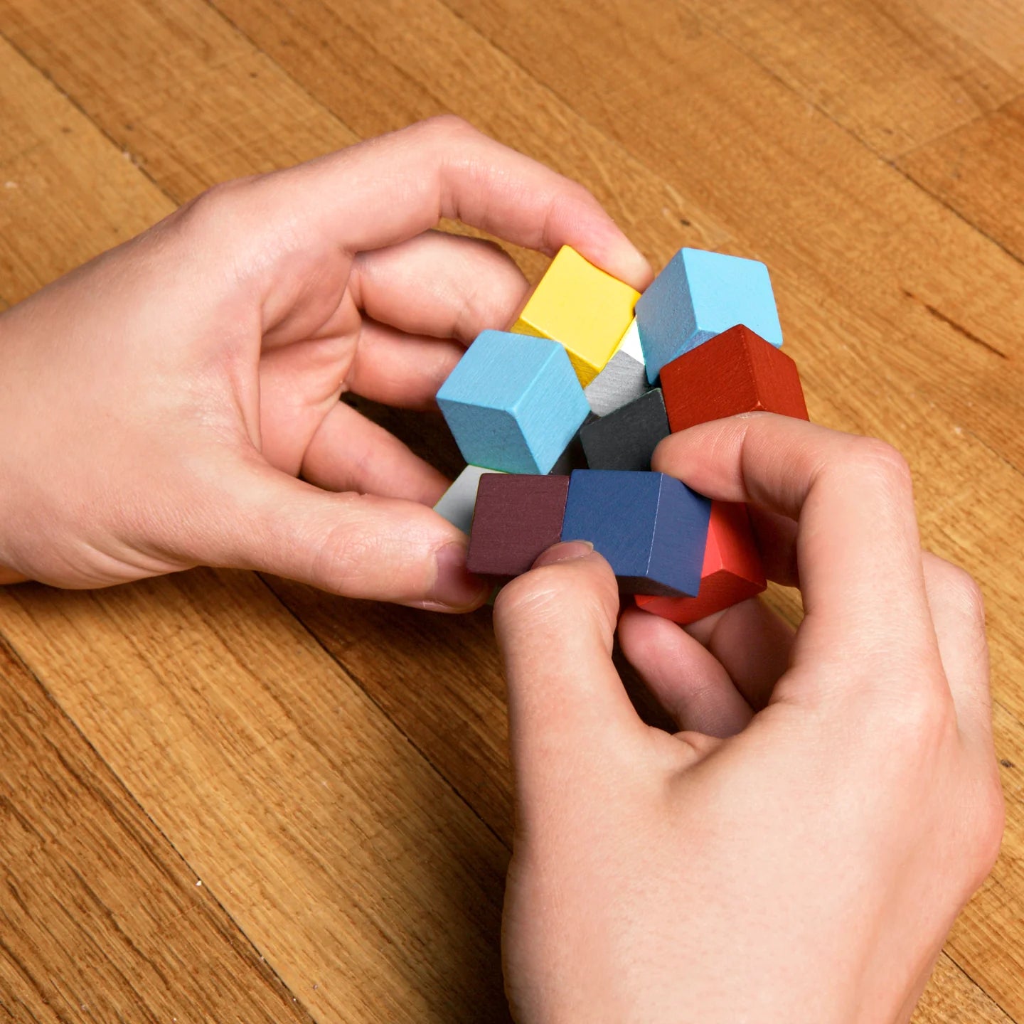 Puzzle Holz Elasti Cube 3D - Kikkerland